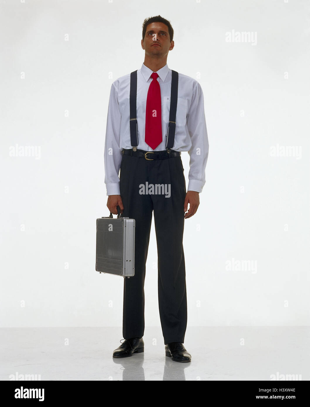 Businessman, briefcase, professions, studio, cut out, man, stand, wait, waiting Stock Photo Alamy