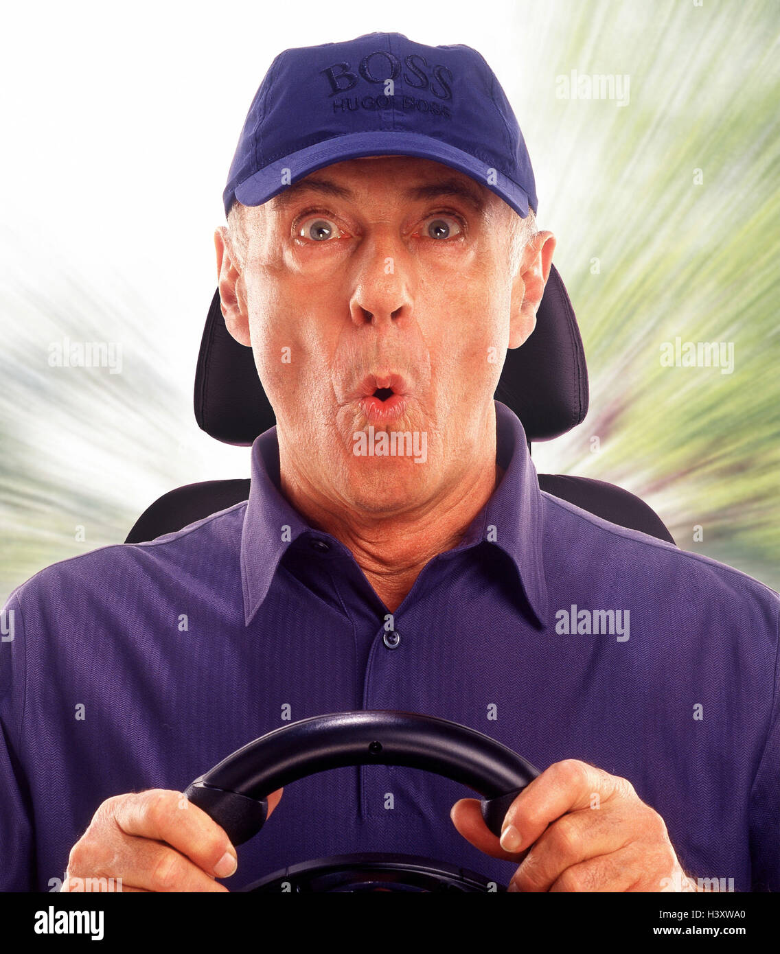 Senior, motoring, cabriolet, facial play, is surprised, surprises, portrait, Senior, studio, car, drive, fast, excursion, spin, outside, man, old, sign cap, astonished, astonishment, in amazement, surprise, situation, perilously, dangerously, danger, speed, Stock Photo
