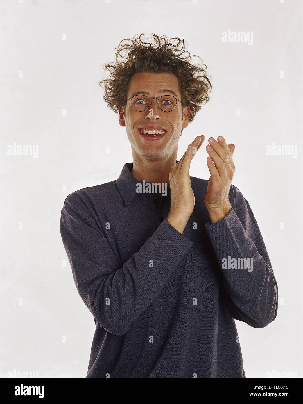 Man, young, glasses, gesture, applause, smile, bang, half portrait, Men, hairs, wavy, curls, blond, studio, cut out, hand, hand, applause, applaud, enthusiasm, approval, joy, Stock Photo