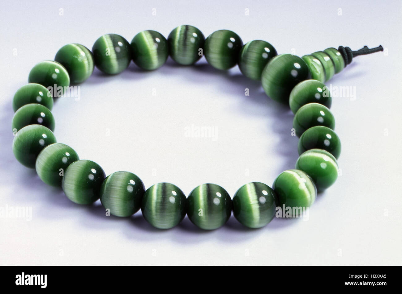 Mother of pearl and green cat eye bracelets