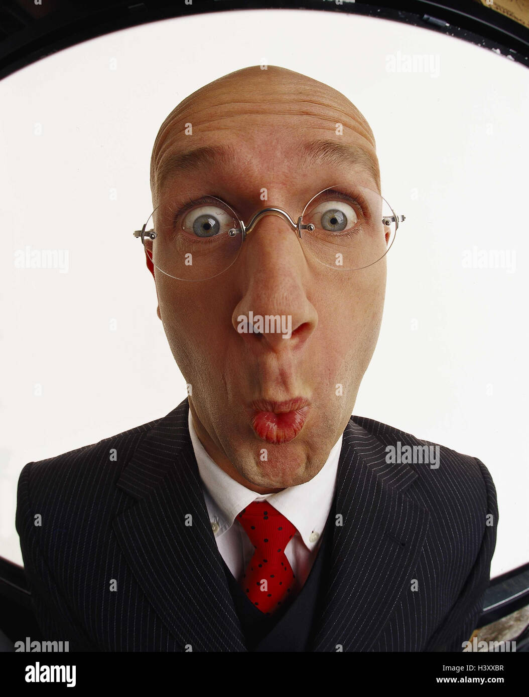 Man, bald head, glasses, suit, facial play, is surprised, surprises, portrait, made unfamiliar Men, head, bald, shaves, hairlessly, astonished, astonishment, surprise, overpowers, impresses, amazed, enthusiastically, enthusiasm, view, viewer, visit, visit Stock Photo