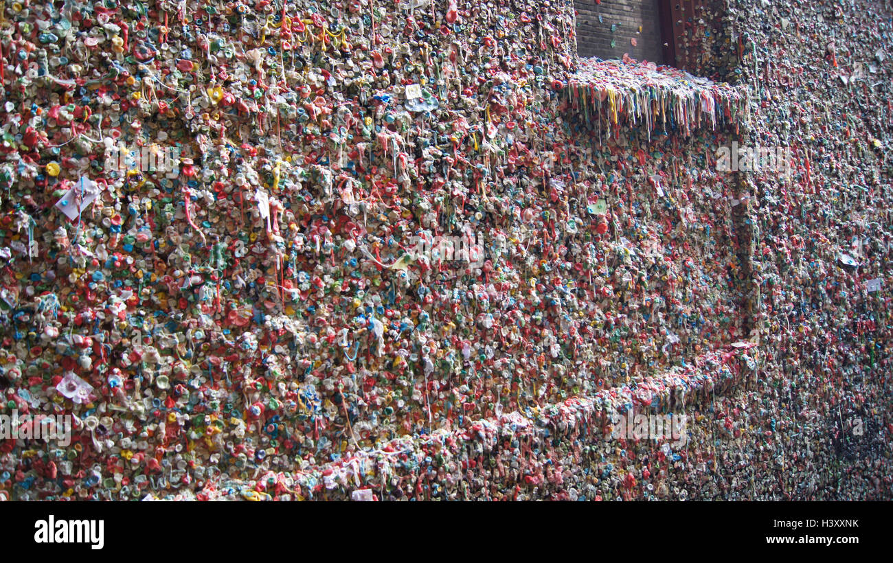 SEATTLE, WASHINGTON STATE, USA - OCTOBER 10, 2014: The Market Theater Gum Wall in downtown. It is a local landmark in Post Alley under Pike Place. Stock Photo