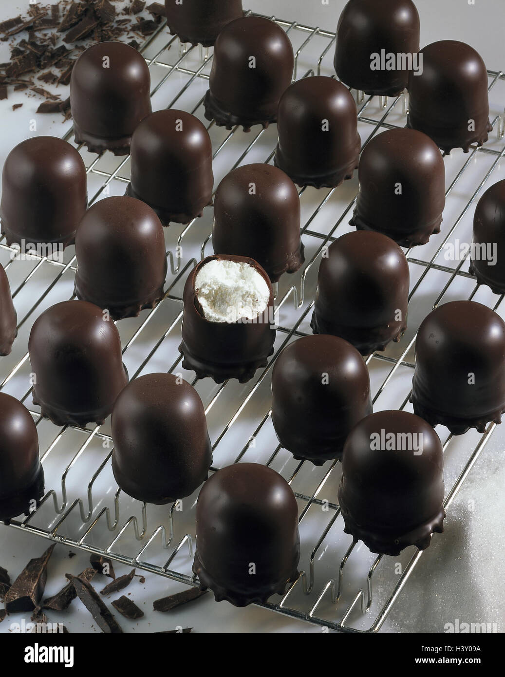 Grating chocolate marshmallow still life hires stock photography and