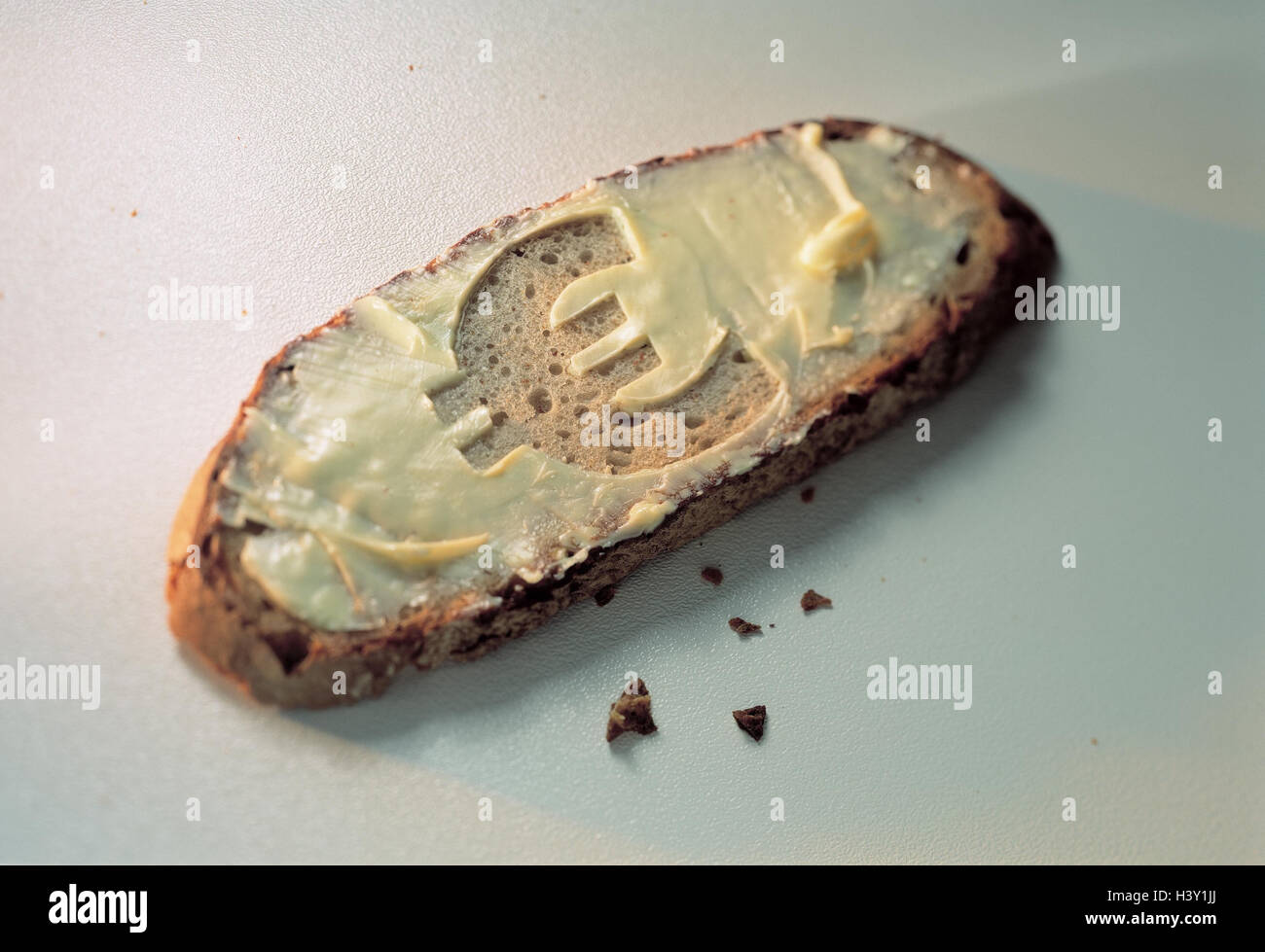 Icon, eurointroduction, slice bread, butter, euro-character, Still life, euro, currency, single currency, changeover, the EU, Europe, means payment, food, eat, price incline, price reduction, spread, studio Stock Photo