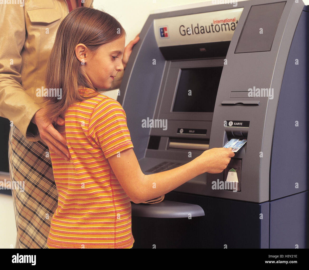Bank, bancomat, nut, child, EC-card, would break in, woman, girl, automatic cash dispenser, identity card, check card, credit card, finances, money, cash, take off, icon, easily, Stock Photo