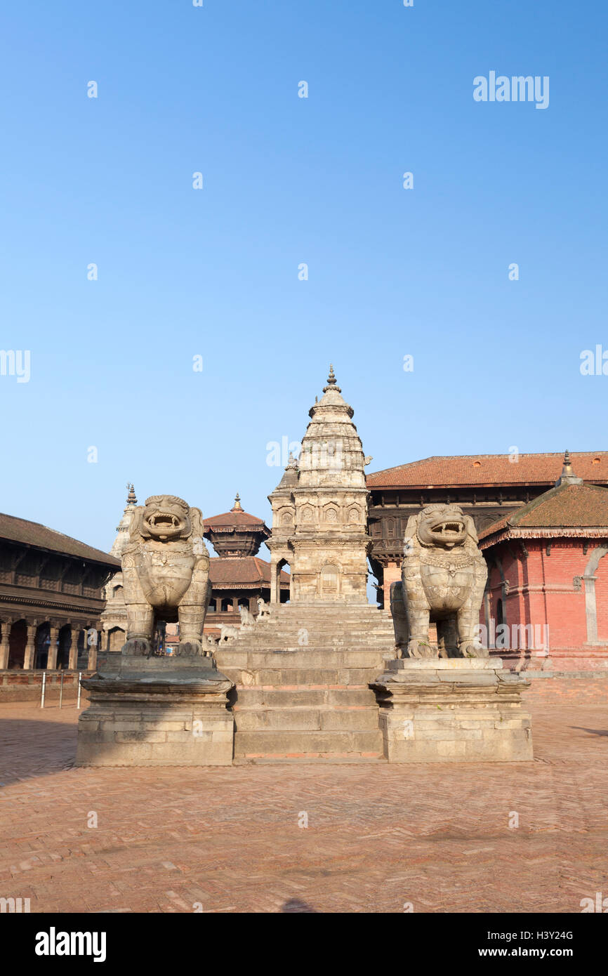 Stone Lions at Indra Varna Madavihar, Bhaktapur, Nepal Stock Photo