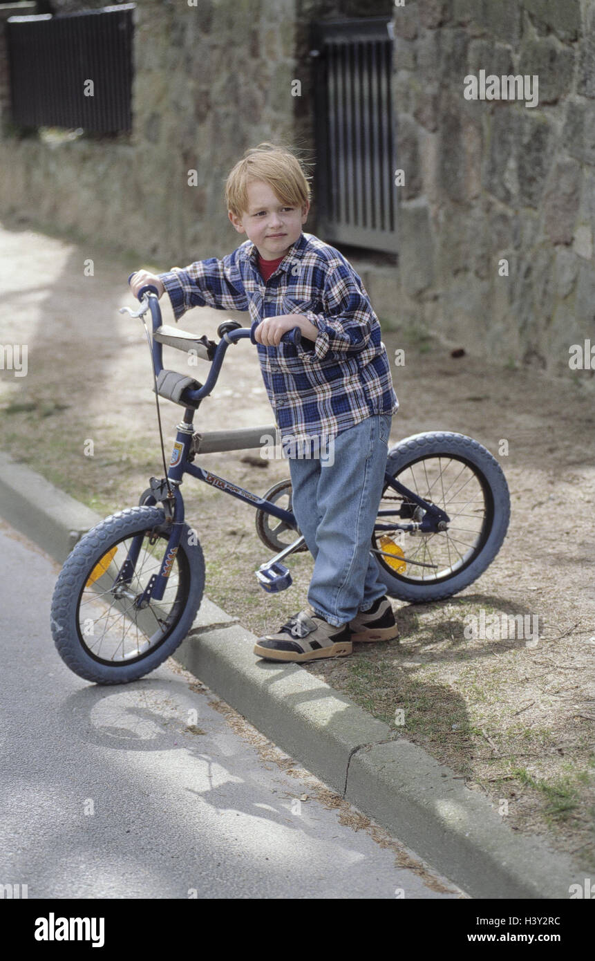 Roadside, boy, bicycle, pavement, cross, outside, street, sidewalk, side the street, change, child, 6 years, road users, radian, leisure time, childhood, danger, dangerously, danger situation, carefully, attention Stock Photo