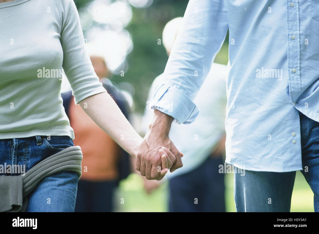 Couple, walk, hand in hand, detail, model released, partnership, partner, detail, hands, hold, go for of a walk, hold hands, affection, love, touch, leisure time, cohesion, very close Stock Photo