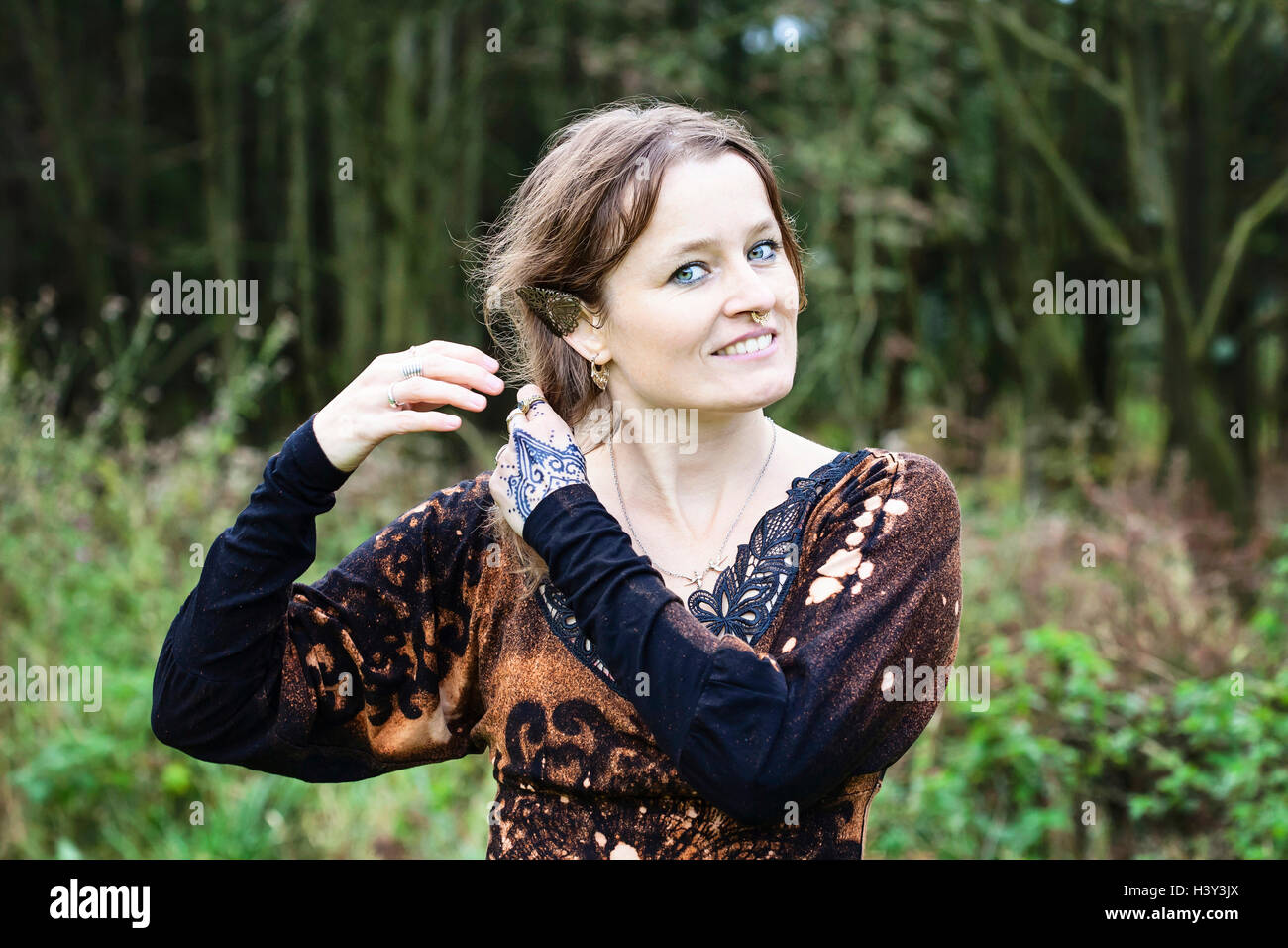 Elven woman in forest Stock Photo