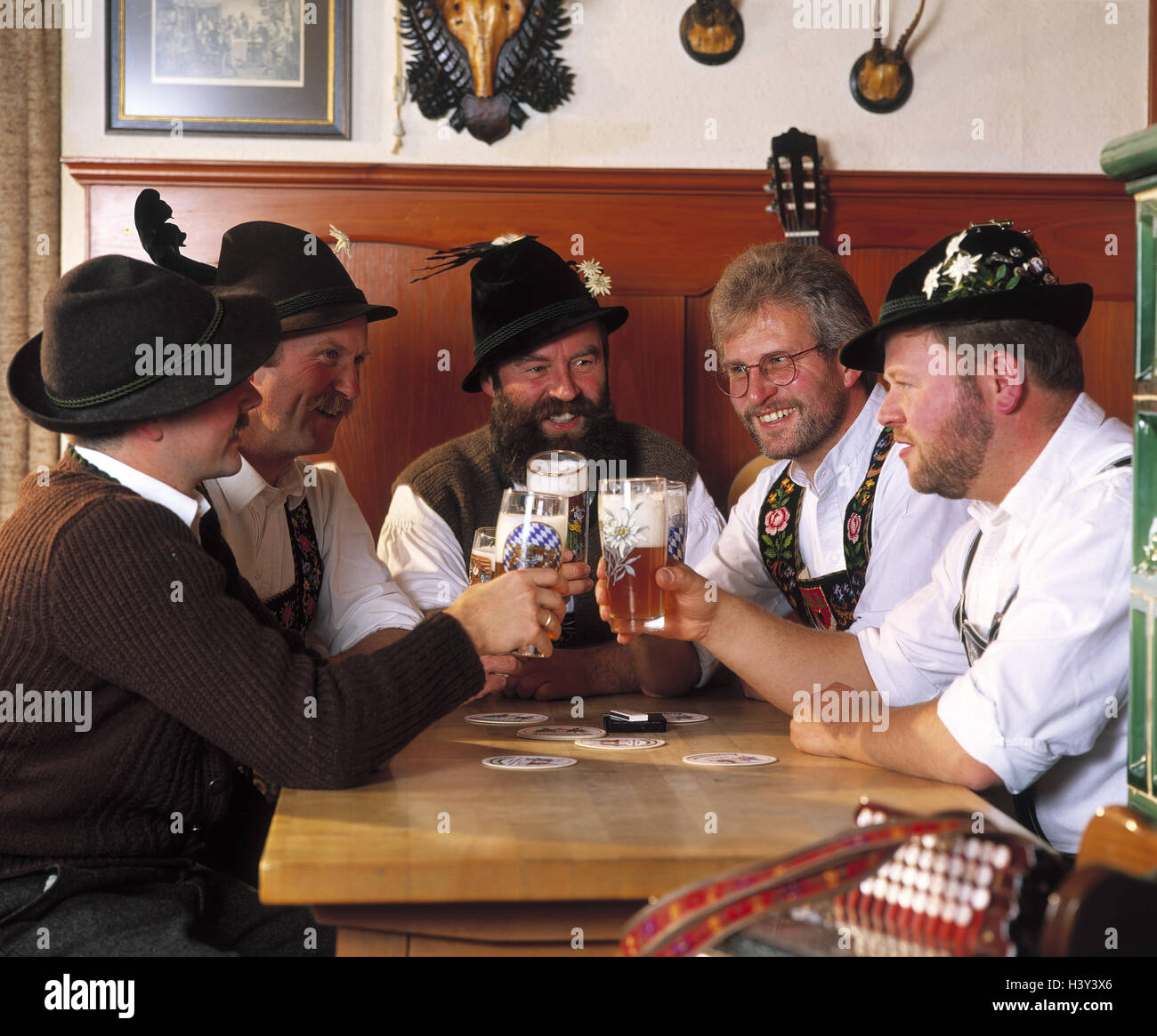Inn, detail, regular table, men, national costume, beer, drink, kick off inside, Bavarian, raise the glass, leisure time, hobby, five, Bavaria, near, sit, friends Stock Photo
