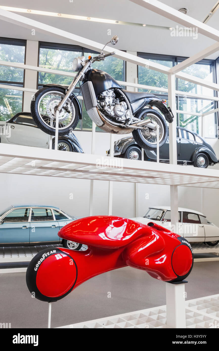 Germany, Bavaria, Munich, The Pinakothek Museum of Modern Art (Pinakothek der Moderne), Exhibit of Cars and Motorcycles Stock Photo