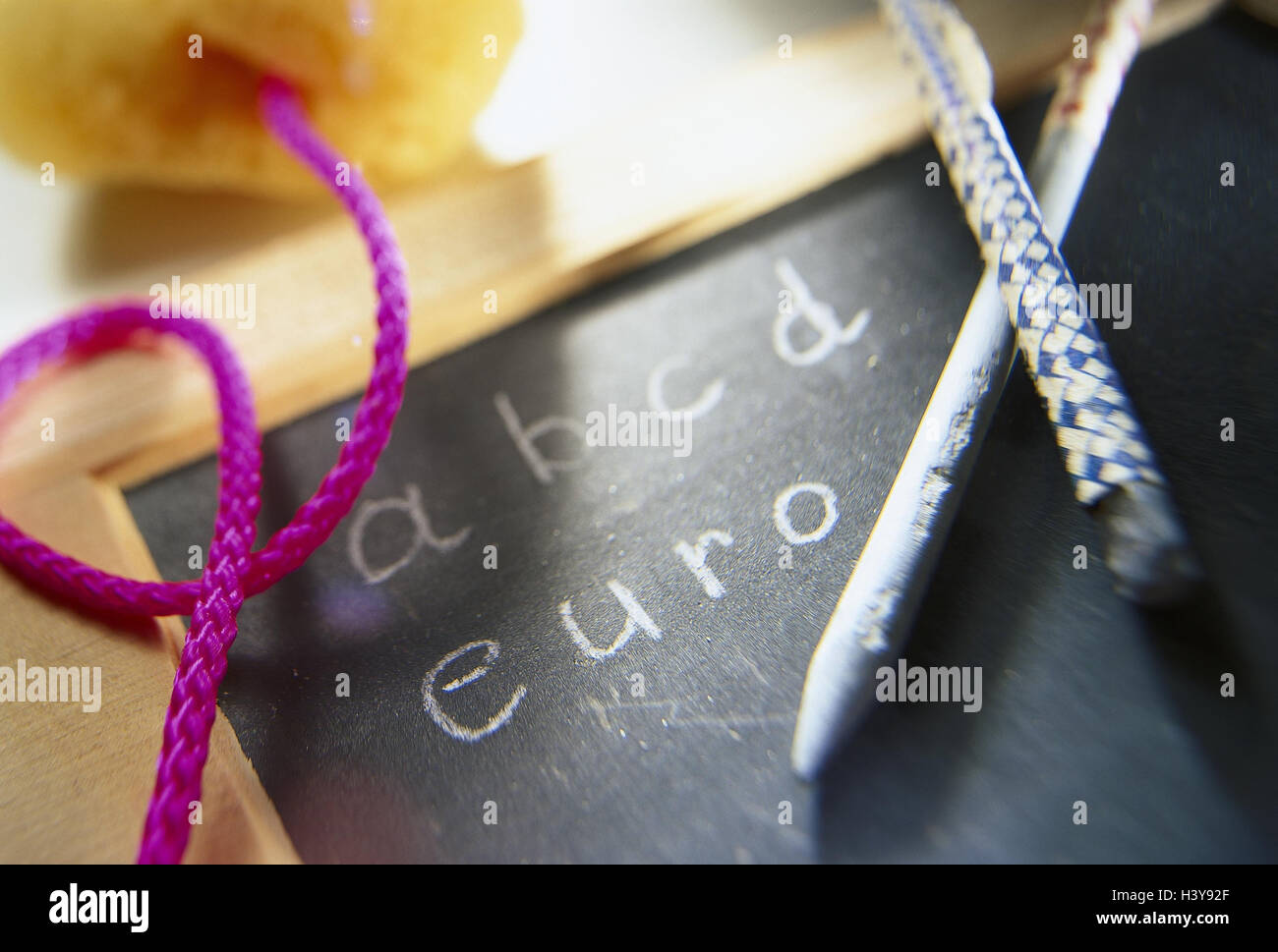 Slate, pen, chalk, fungus, letter, stroke, euro notice board, currency, European monetary union, economy, single currency, Europe, alphabet Stock Photo