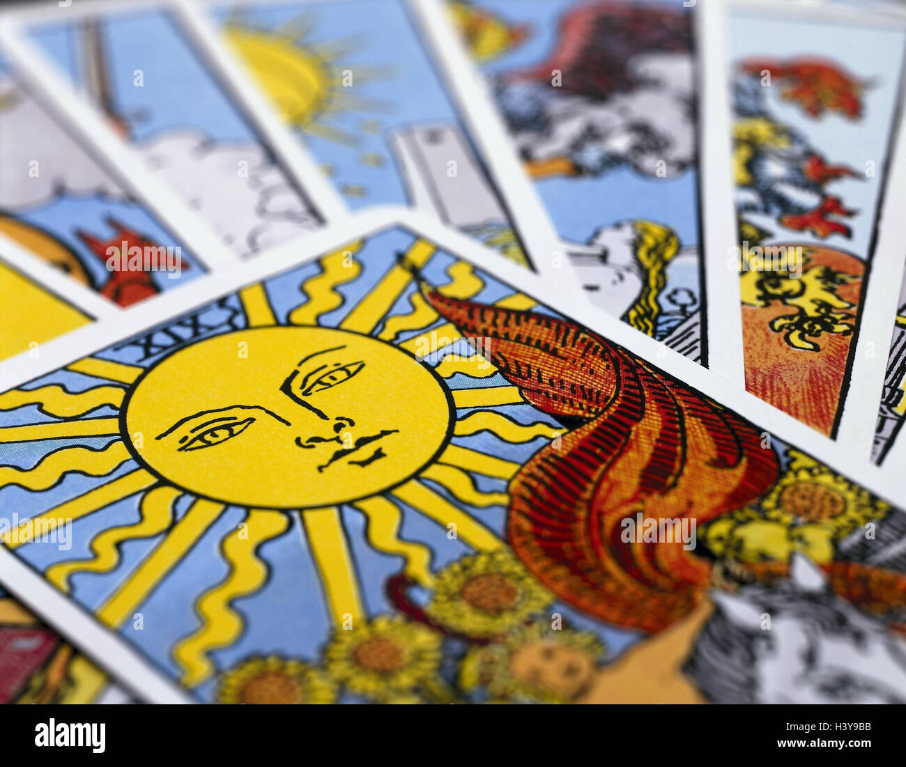 Card game, tarot, Rider Waite, playing cards, about one another, detail, 'The sun' esotericism, spiritualism, nine, tarot cards, tarot card, reading the cards, prediction, prophecy, future, interpretation, playing card, fanned out, Rider Waite tarot Stock Photo