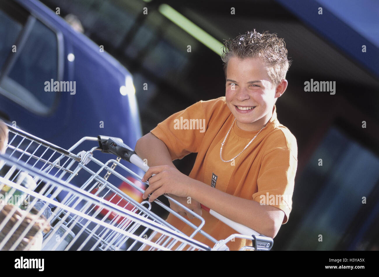 Boy, shopping, shopping carts, outside child, young person, teenager