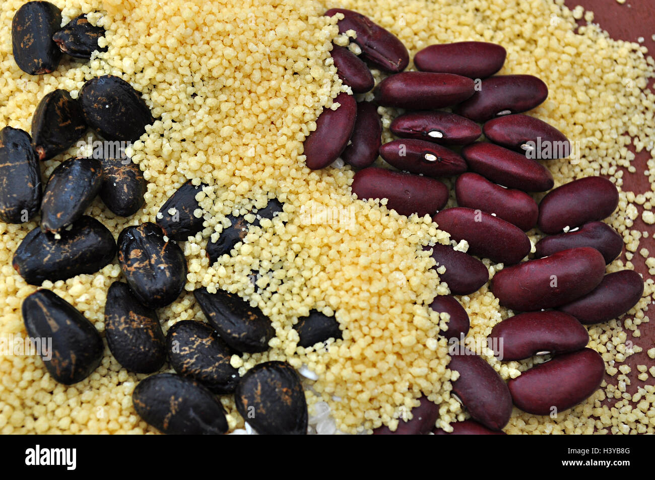 couscous and colored seeds Stock Photo Alamy