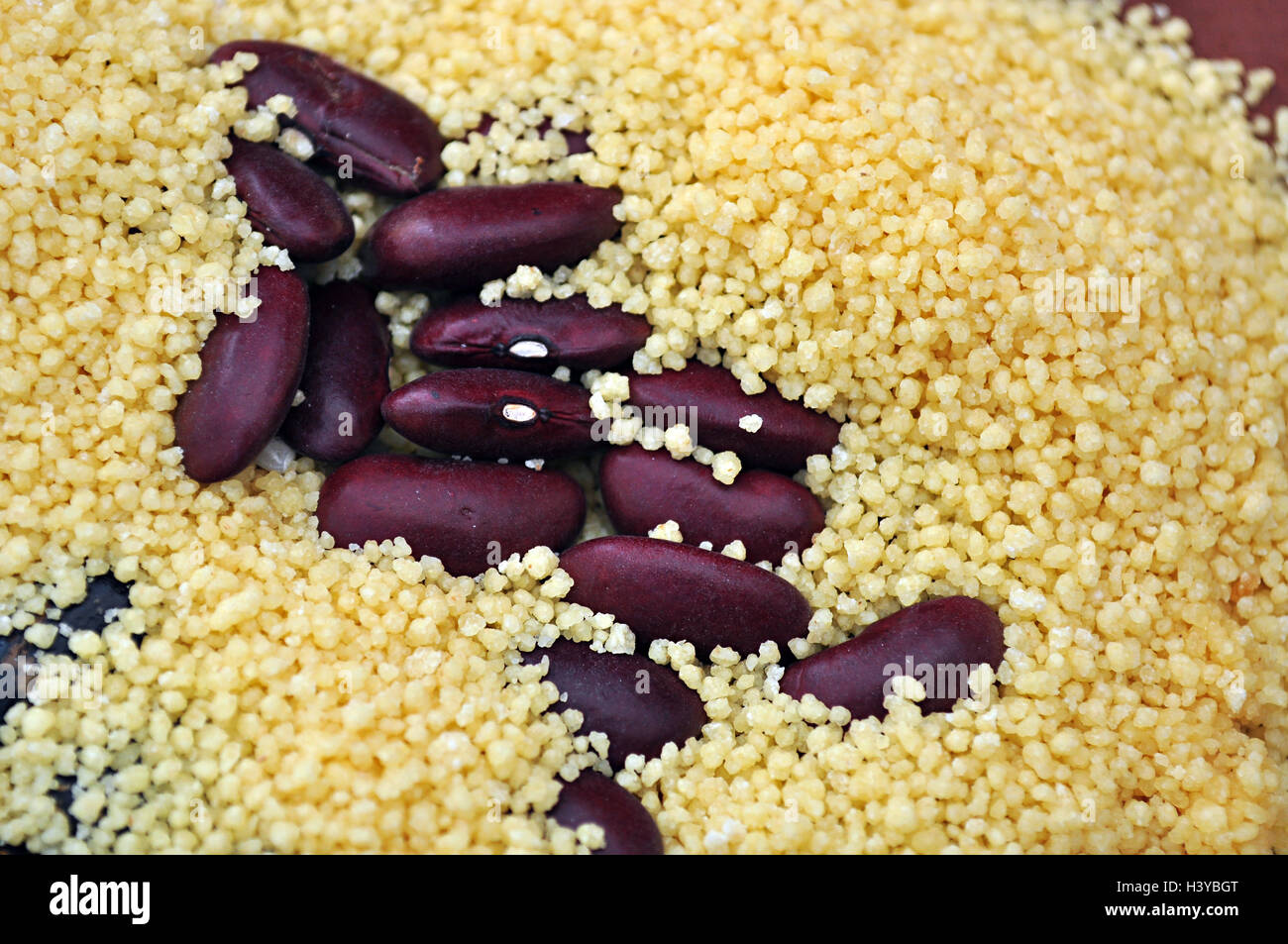 couscous and colored seeds Stock Photo Alamy