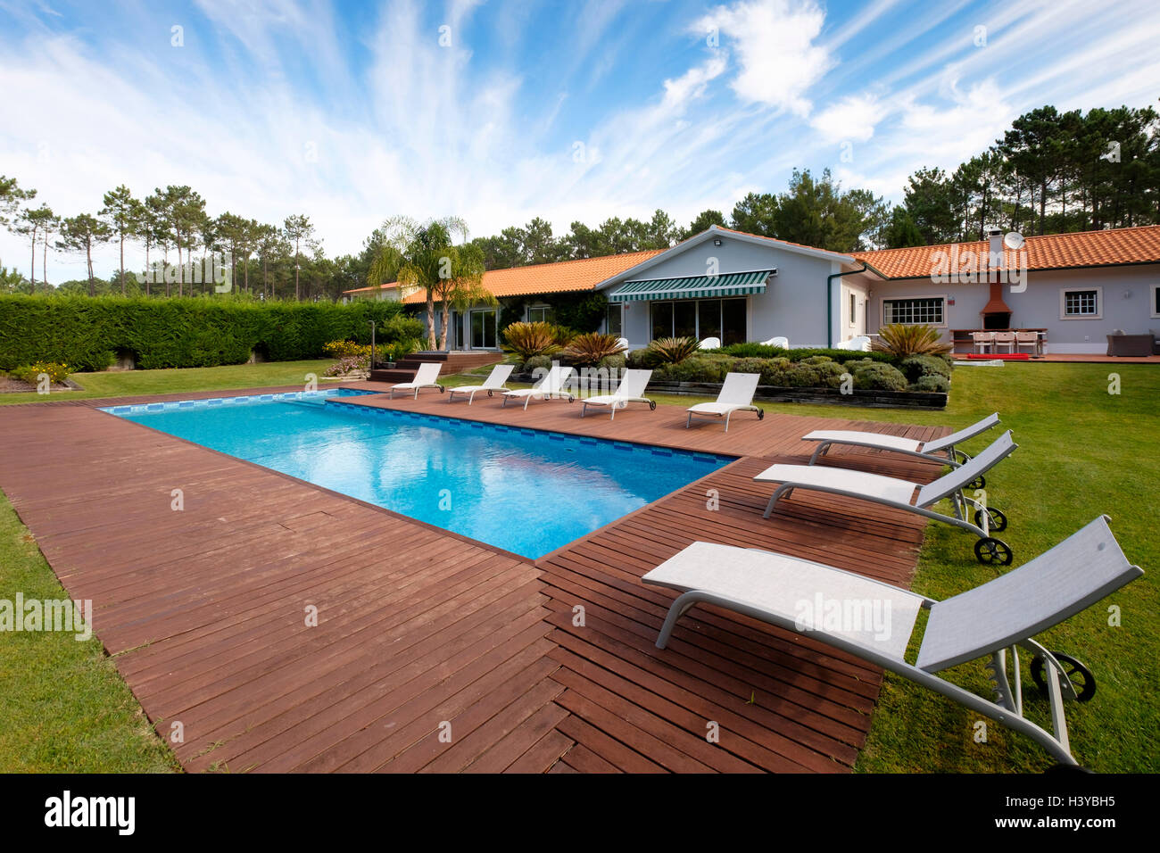 Big house with outdoor swimming pool Stock Photo
