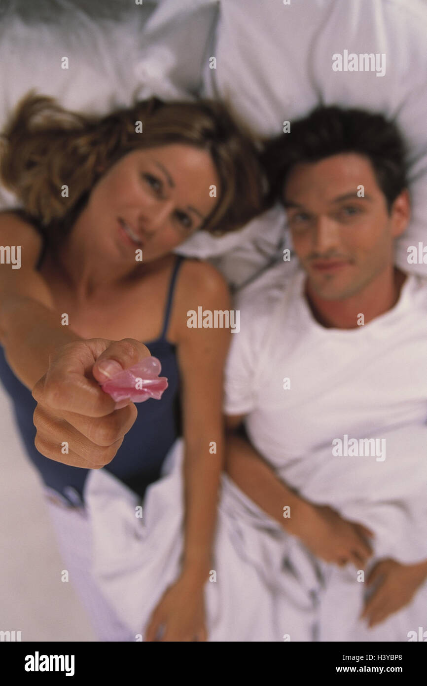 Bed, couple, happy, lie, condom, portrait, from above, at home ...