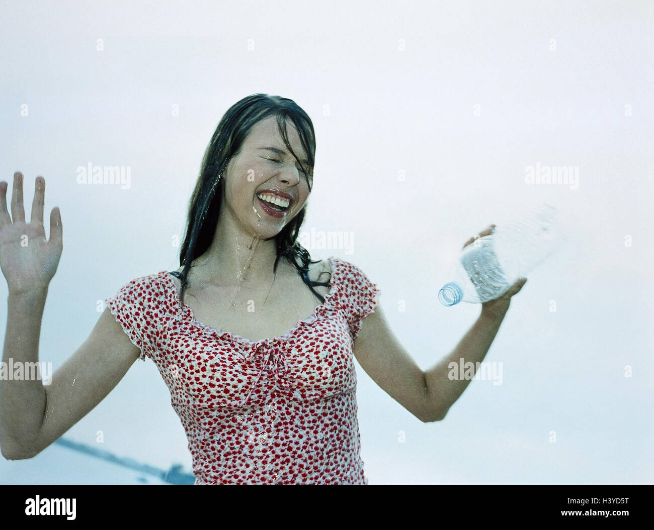 Woman, water Bottle, emptied, look, wet, gesture, half portrait, beach, vacation, leisure time, young, Bottle, water, blank, refreshment, cooling, fun, laugh, joke melted, cheerfulness, cheerfully, amusements, happy, stupidly, lifestyle, outside, very clo Stock Photo