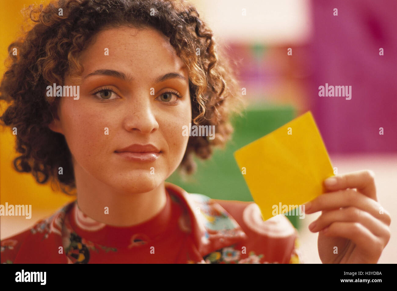 Woman Seriously Yellow Card Point Portrait Model Released Outside 