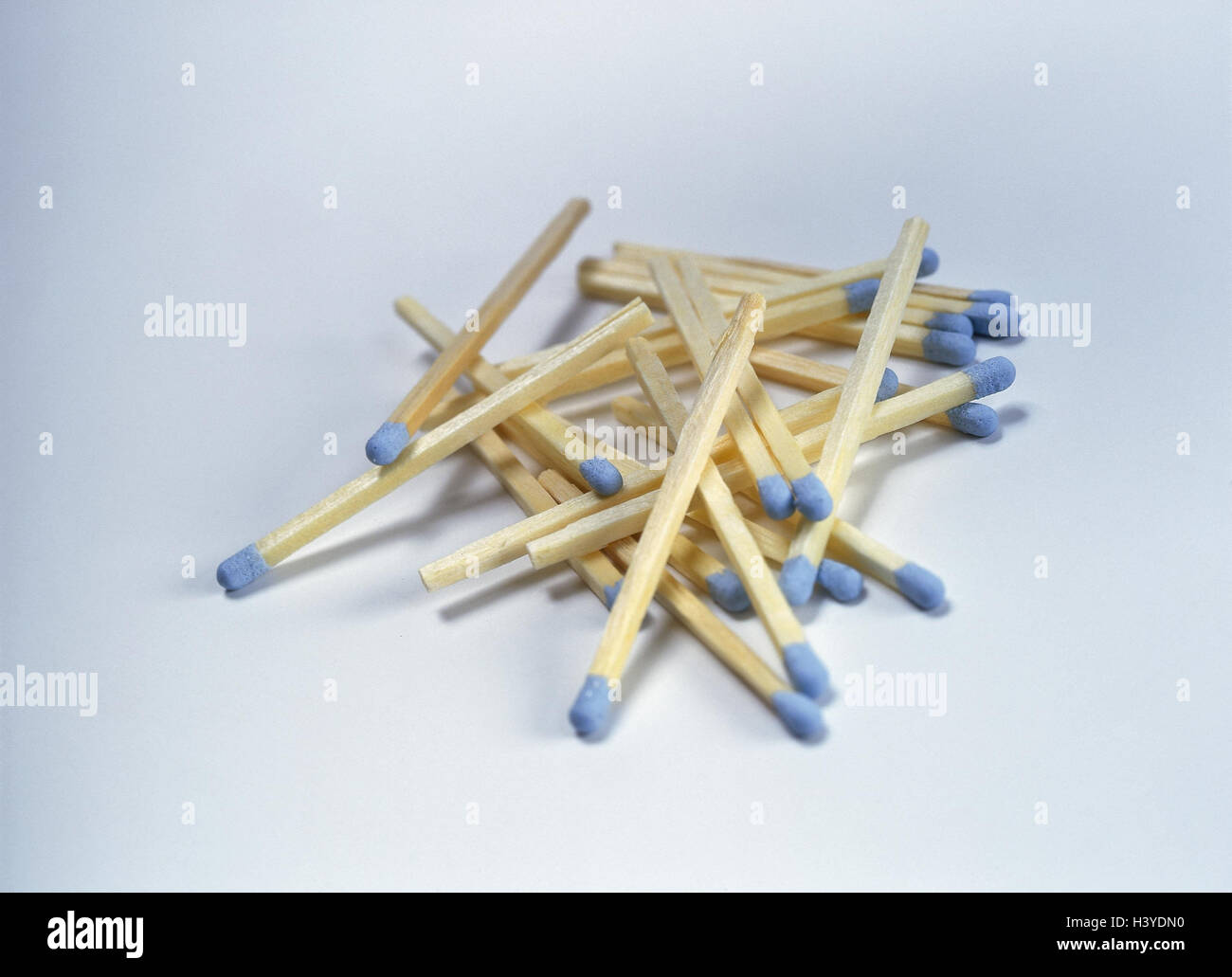 Matches, hot bulbs, light blue matches, match heads, hot bulbs, fuses, sulphur heads, product photography, Still life Stock Photo