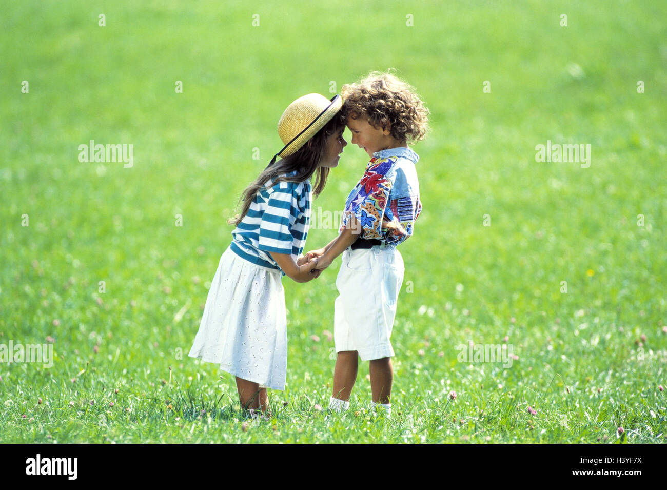 Meadow, girl, boy, hands hold, eye contact, outside, children, two, comradeship, affection