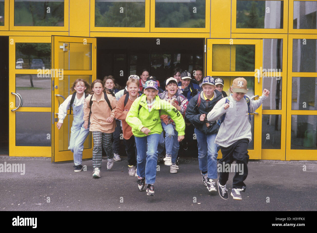 School end, schoolboy, stairs, run, please melted, school, school, boy, girl, schoolgirls, no school, teaching end, holidays, summer holidays, school holidays, joy, cheering, rejoice, exuberance, jump, fun Stock Photo