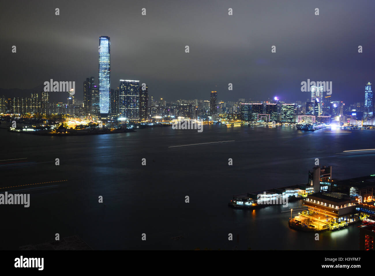aerial view on Peninsula bay by night from Victoria island Hong Kong island China Stock Photo