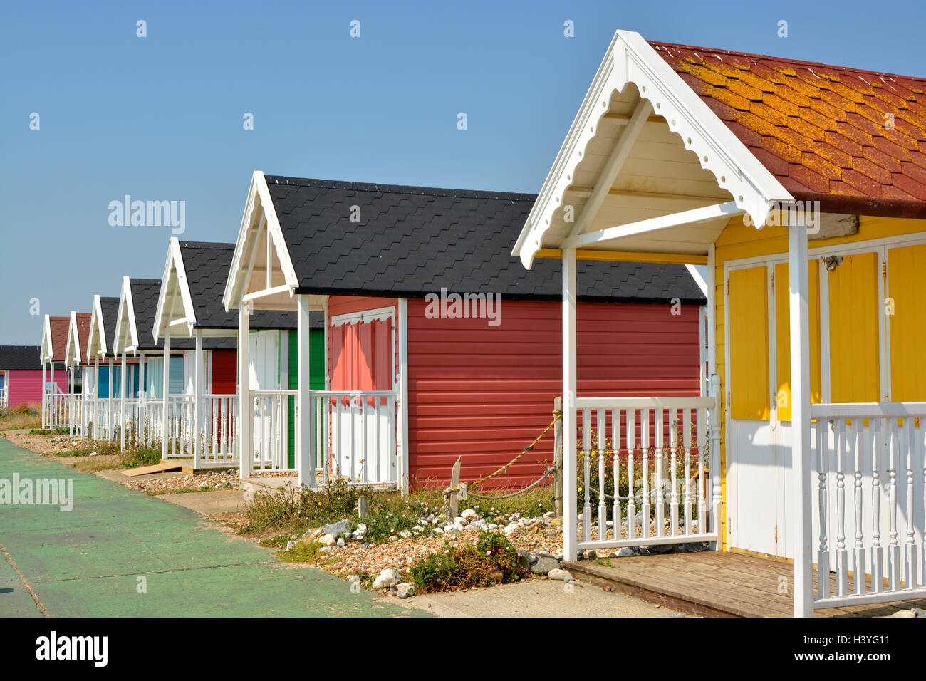 Colourful painted beach huts at Lancing (near Brighton) in West Sussex