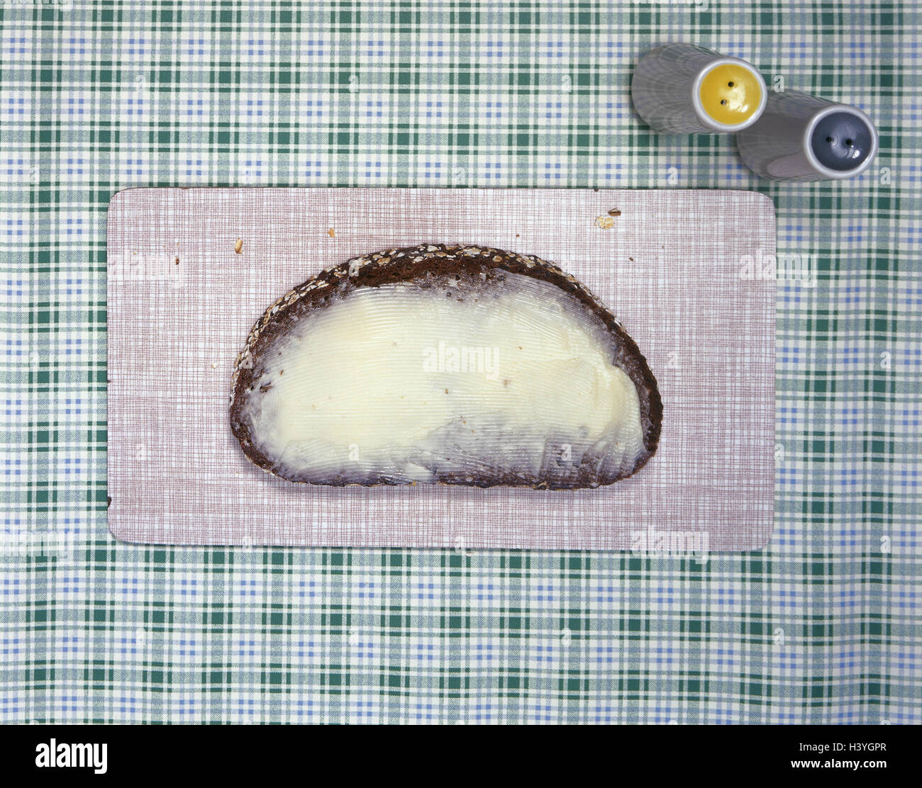 Slice bread, butter, salt-cellar, pepperpot, from above, food, table ...