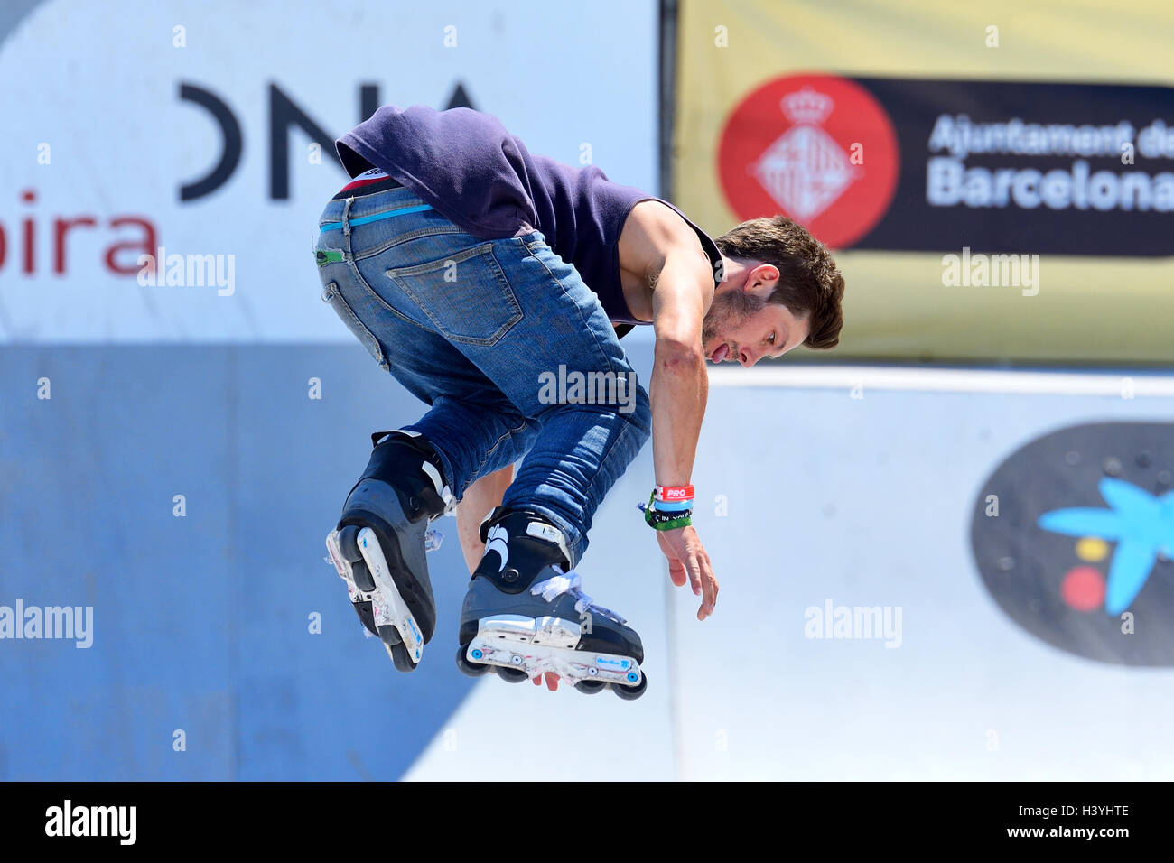 BARCELONA - JUN 28: A professional skater at the inline skating jumps competition at LKXA Extreme Sports Barcelona Games. Stock Photo
