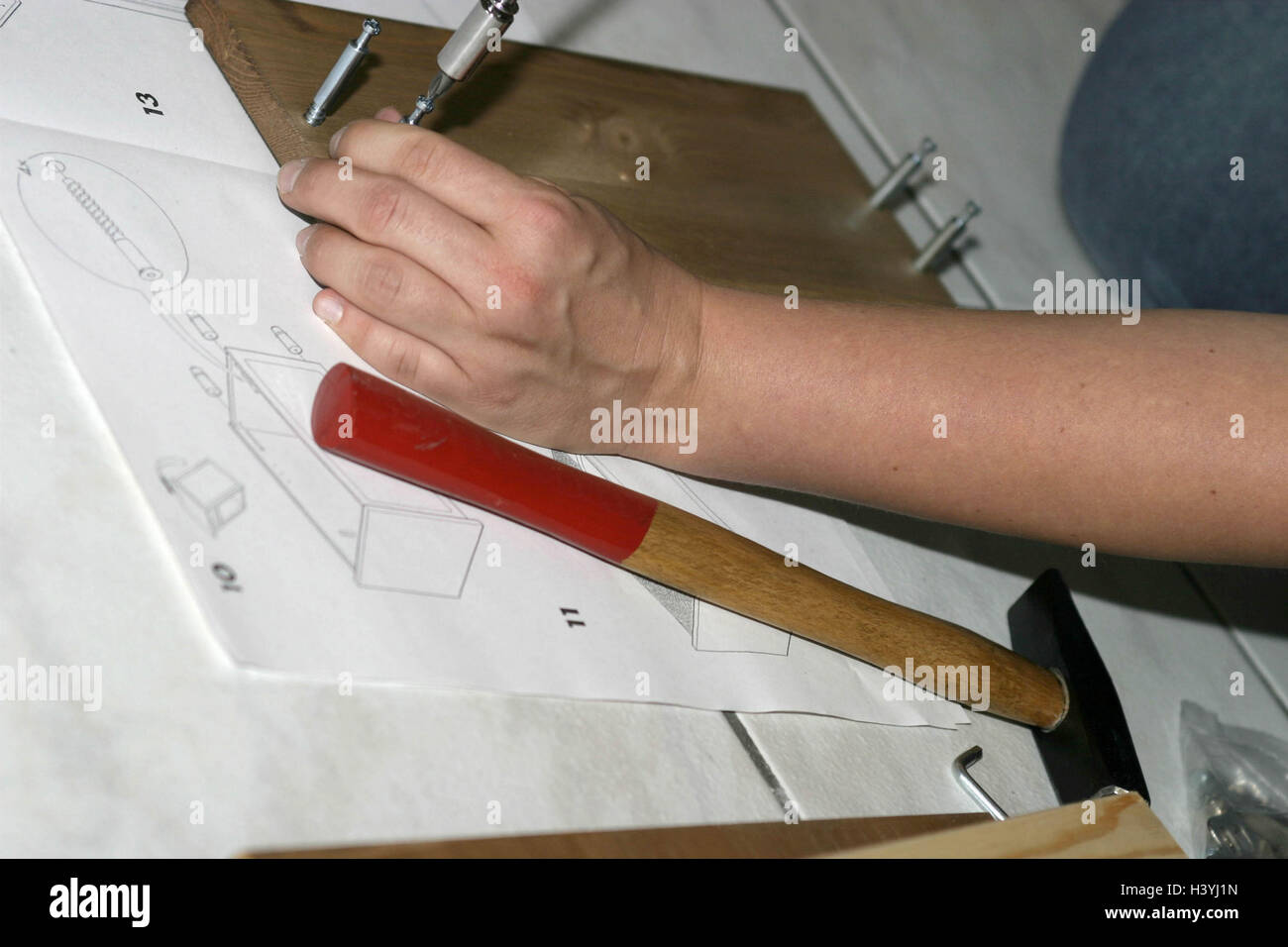 Man, detail, hands, cupboard assemble, screwing screw do it yourself ...