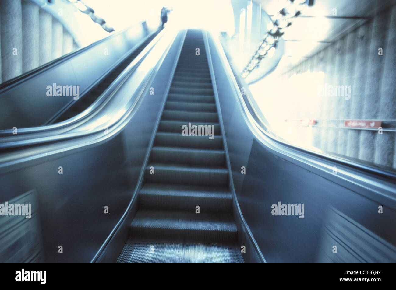 Subway station, escalator, metro, steady sponsor, escalator, stairs, rising, exit, transportation human beings, blank, conception, promotion, success, future, career, business, ray hope, light, back light, destination, loneliness, abandonment Stock Photo