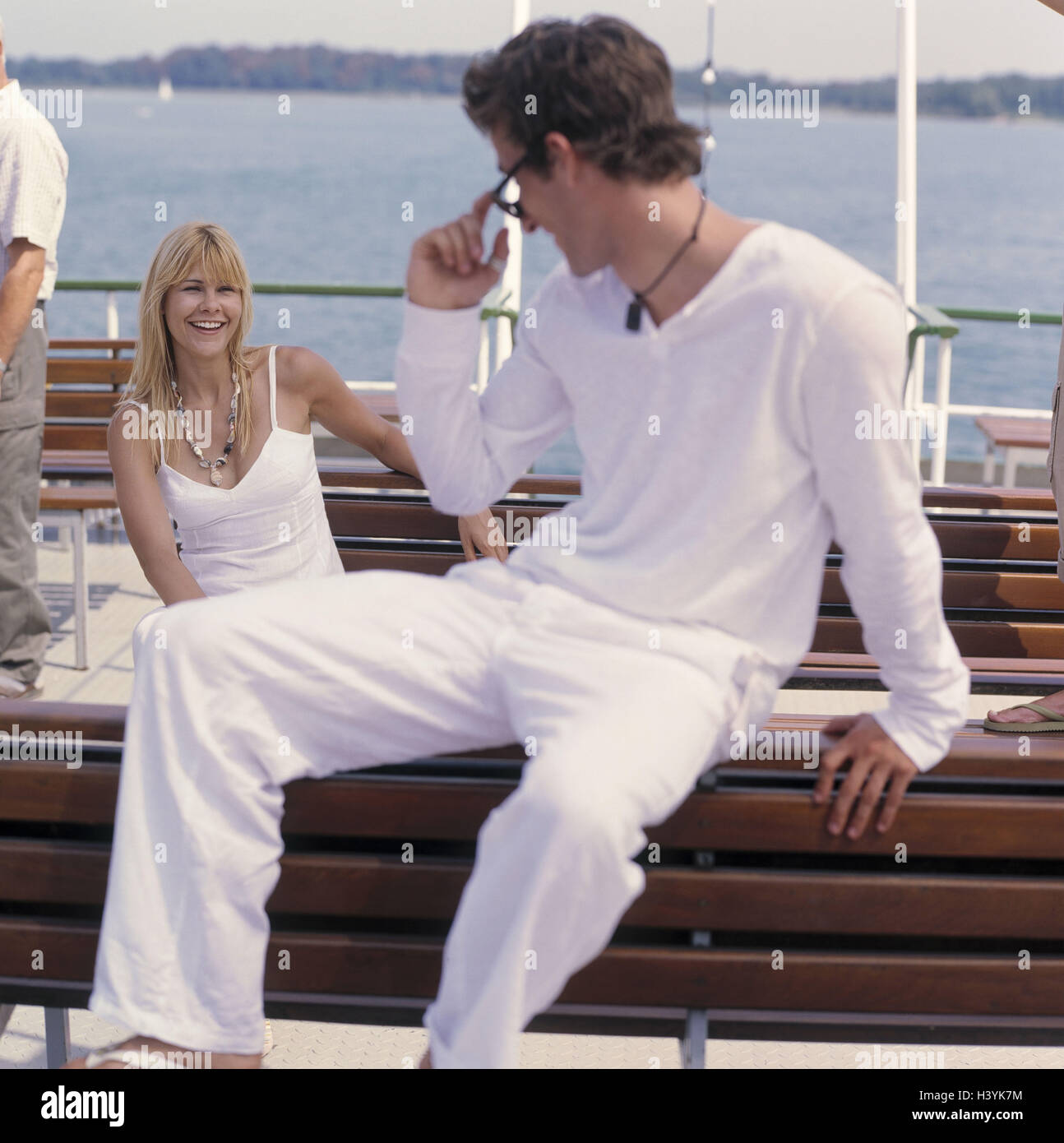 Excursion boat, deck, saddles, couple, flirtation, eye contact, vacation, leisure time, boat tour, boat trip, woman, man, clothes white, flirt, happy, joy, holiday flirtation, get to know, smile, positive mood, outside Stock Photo