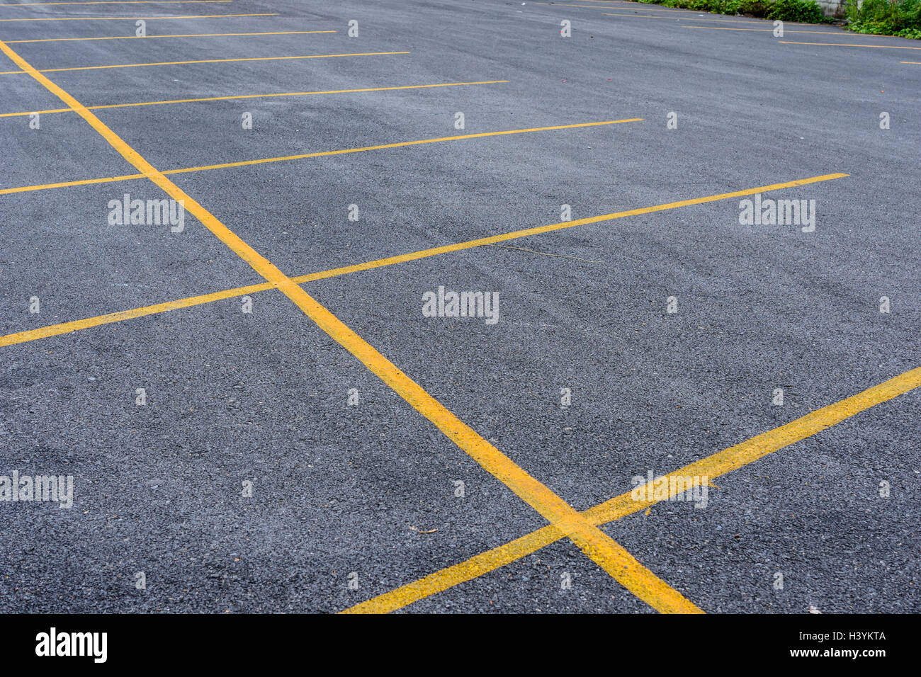 empty parking lot with yellow line Stock Photo