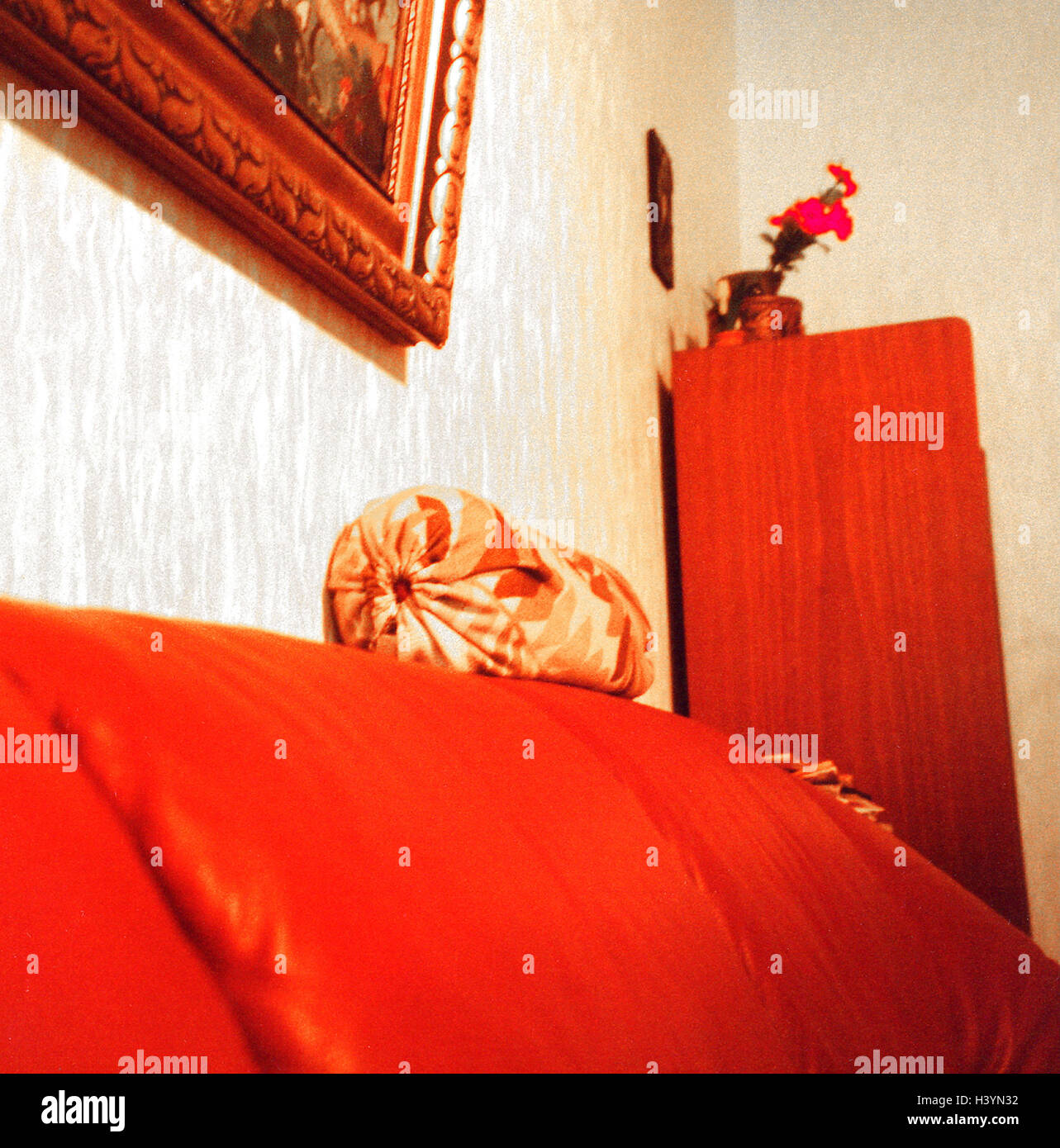Living rooms, sofa, detail   Couch, red, bolster, neck pillows, picture, picture frames, closet, coziness, straight, conservative, antiquated, old, quietly life Stock Photo