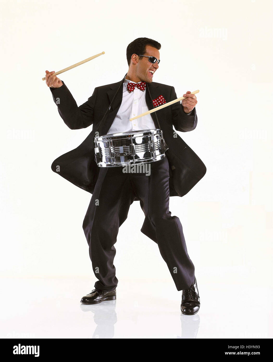 Man, young, suit, sunglasses, music, Tommeln Men, cut outs, studio, drummer, drum, drumsticks, Sticks, hit, drummer, music, musician, enthusiastically, action, melted, enthusiasm, percussion instrument, instrument, musical instrument Stock Photo