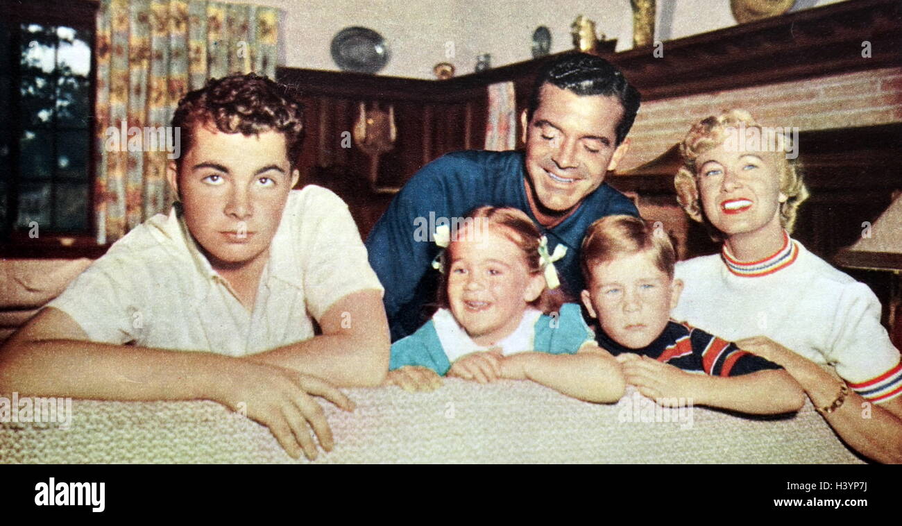 Photograph of Dana Andrews (1909-1992) an American actor, with his wife  Mary and family. Dated 20th Century Stock Photo - Alamy, image size:1300x758