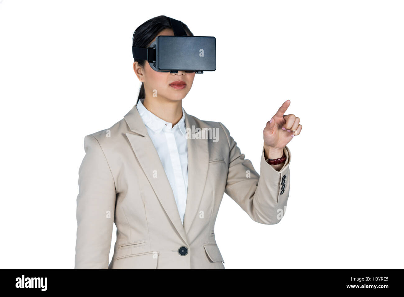 Businesswoman using virtual reality headset Stock Photo - Alamy