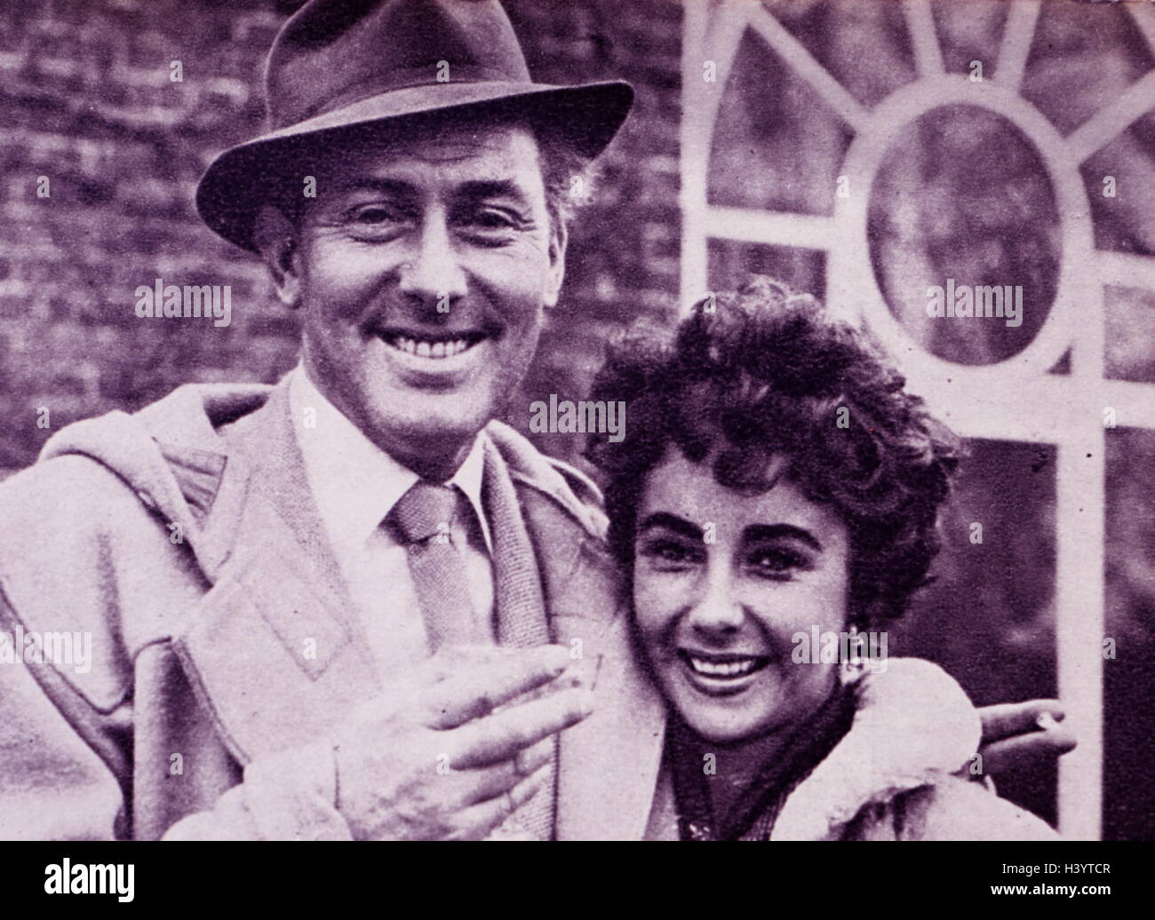 Photograph of Michael Wilding (1912-1979) and his wife Elizabeth Taylor (1932-2011). Dated 20th Century Stock Photo