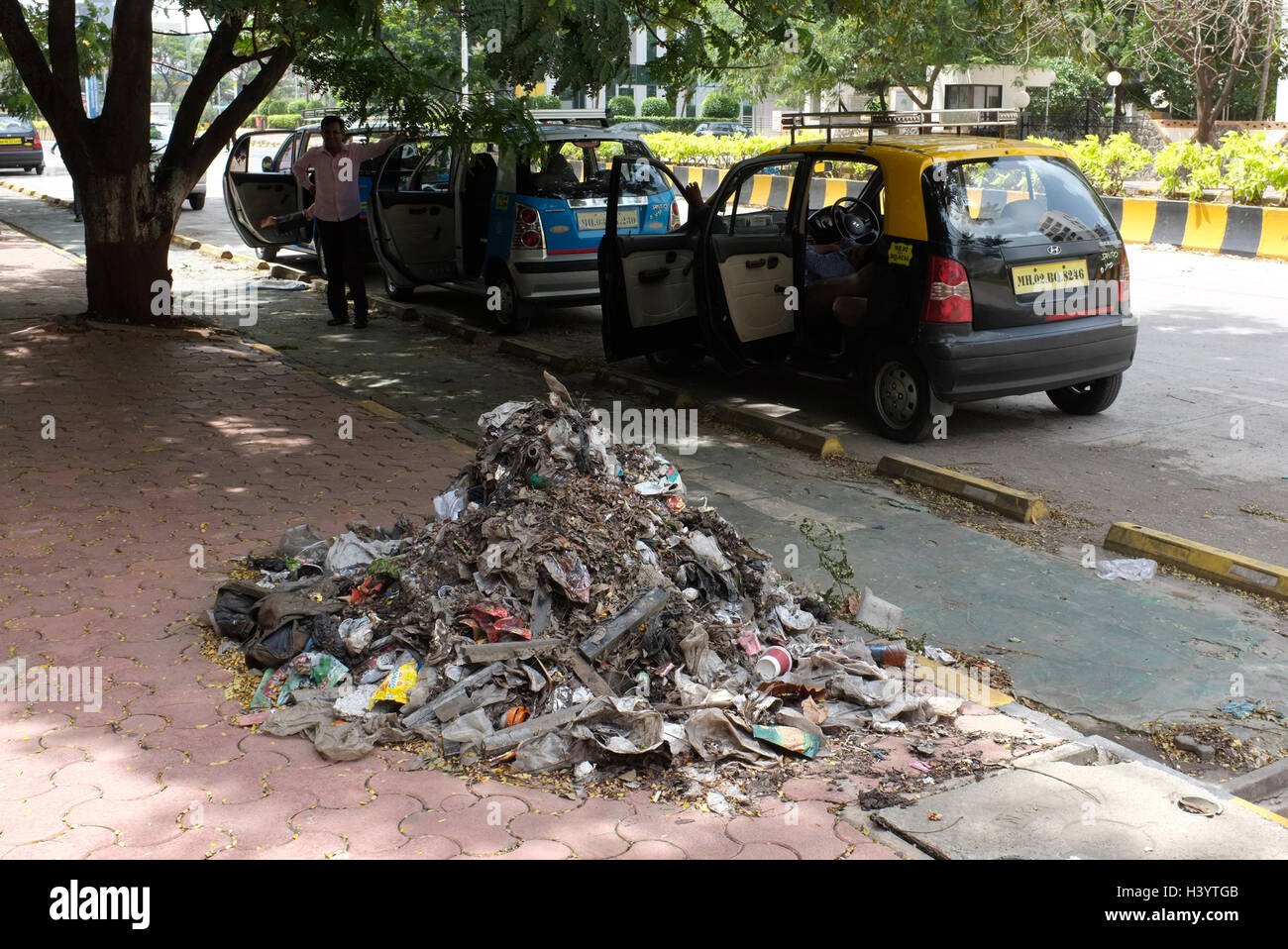 detritus on street in bandra kurla complex. Street scenes Mumbai, India Stock Photo