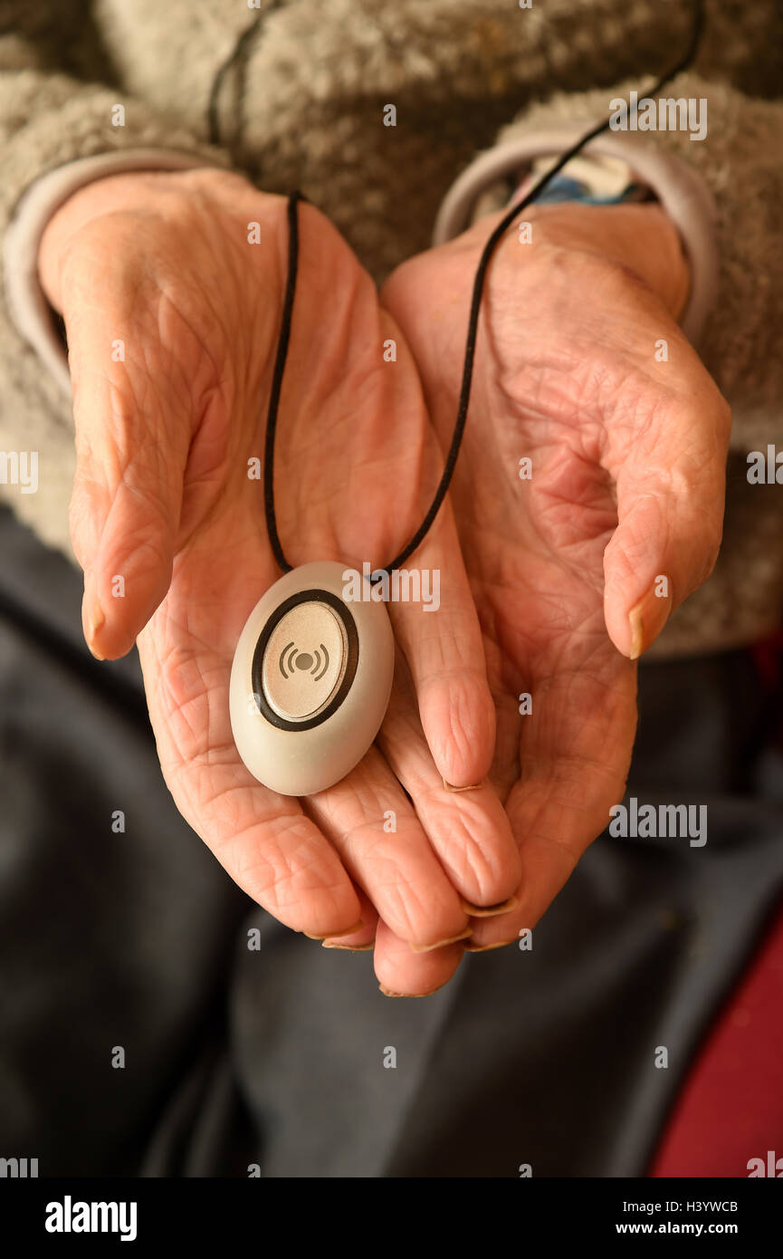Emergency call button, emergency alarm button, remote assistance alarm for elderly people Stock Photo