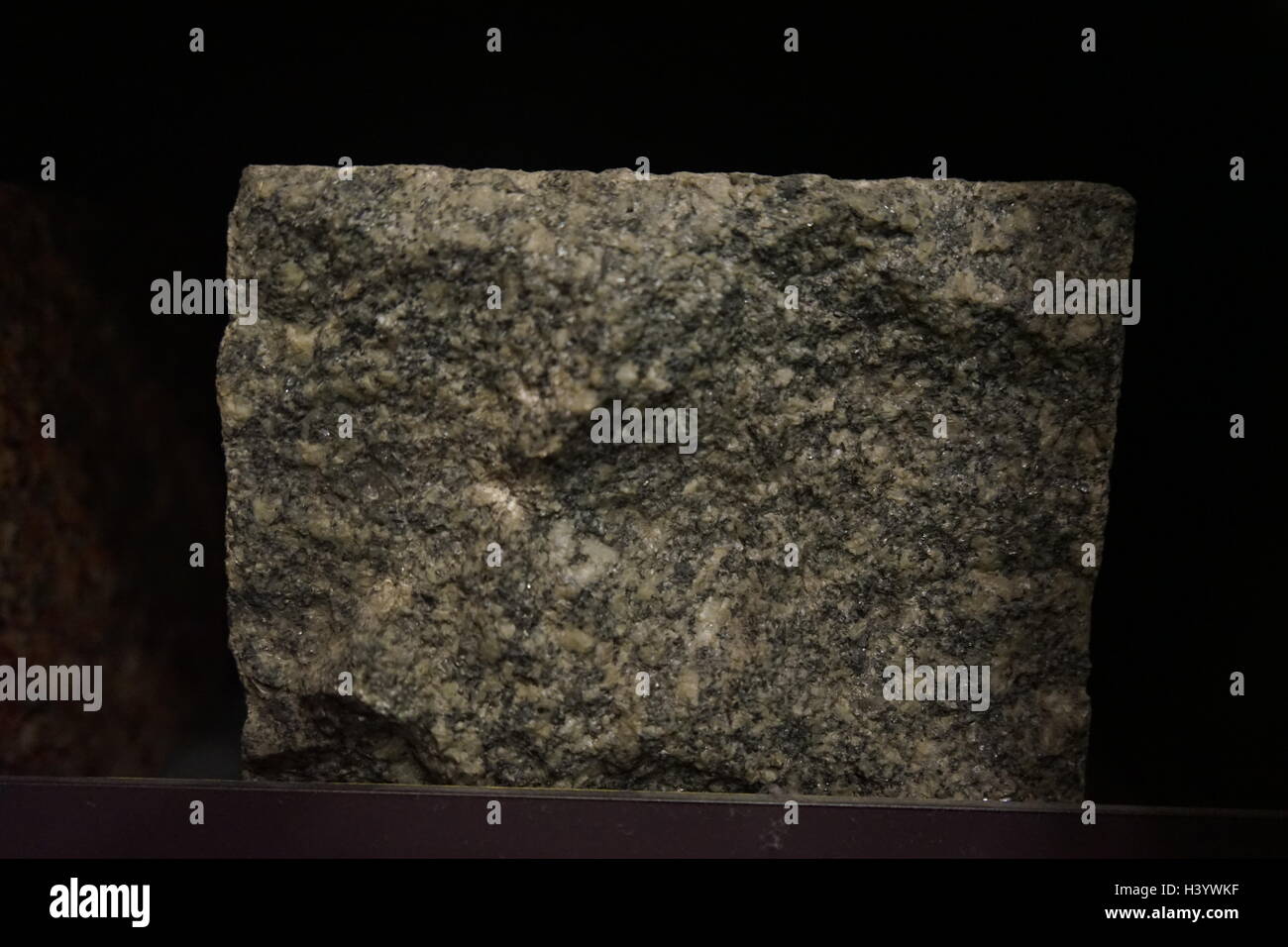 Sample of Granite, a common type of felsic intrusive igneous rock that is granular and phaneritic in texture. Dated 21st Century Stock Photo