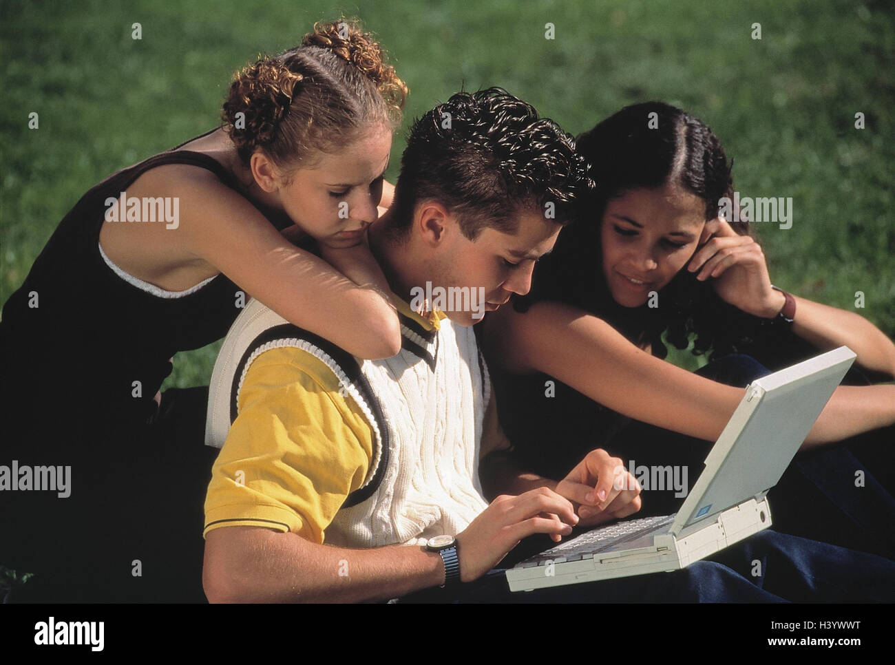 Meadow, teenager, man, young, laptop, input summer, schoolboy, student, young persons, computers, notebook computer, enter, tap, data entry, leisure time, outside Stock Photo
