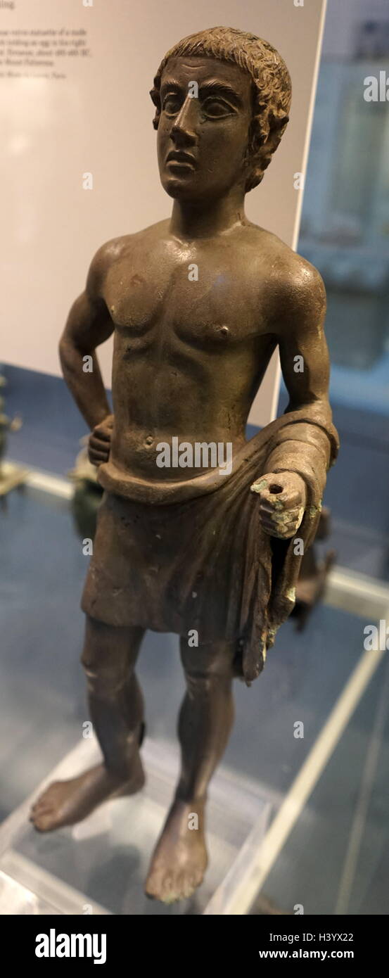Bronze votive statuette of a youth. Dated 5th Century BC Stock Photo