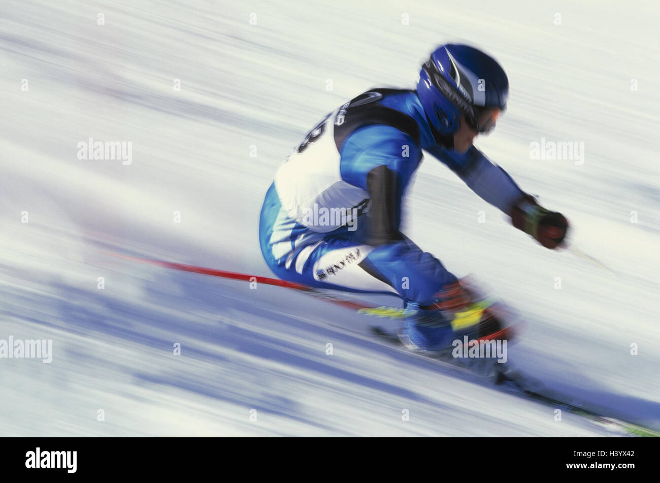 Ski racer, helped to pull, blur skiing, downhill race, giant slalom, gigantic goal foliage, downhill skiing, ski race, race, event, racing driver, skier, skiing, alpine sport, sport, leisure time, hobby, activity, speed, dynamics, motion, tempo, ski equip Stock Photo