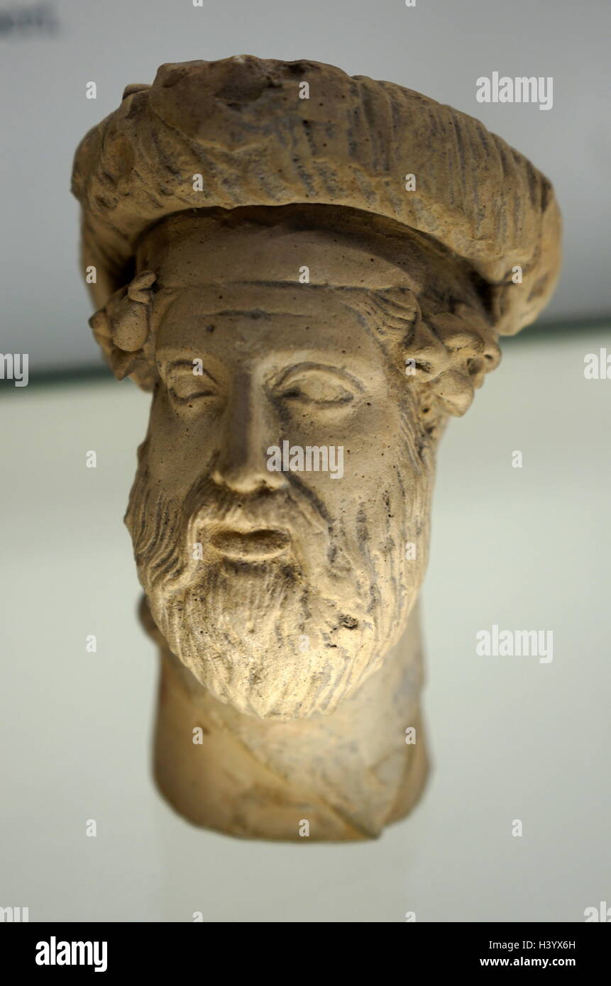 Terracotta head of Dionysus. Dated 4th Century BC Stock Photo