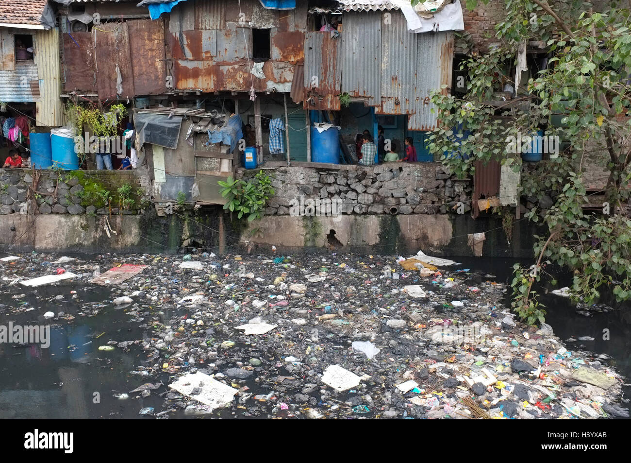 sewerage and slum housing , dharavi slum, mumbai, Maharashtra, india Stock Photo