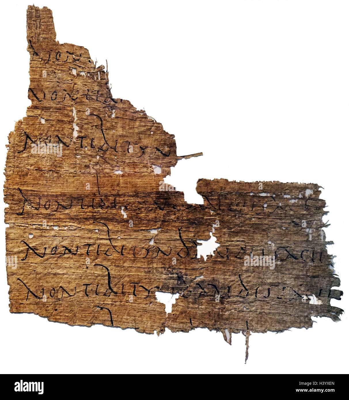 Papyrus with a line of Virgil's Aeneid, which has been repeated as part of a writing exercise. Dated 1st Century Stock Photo
