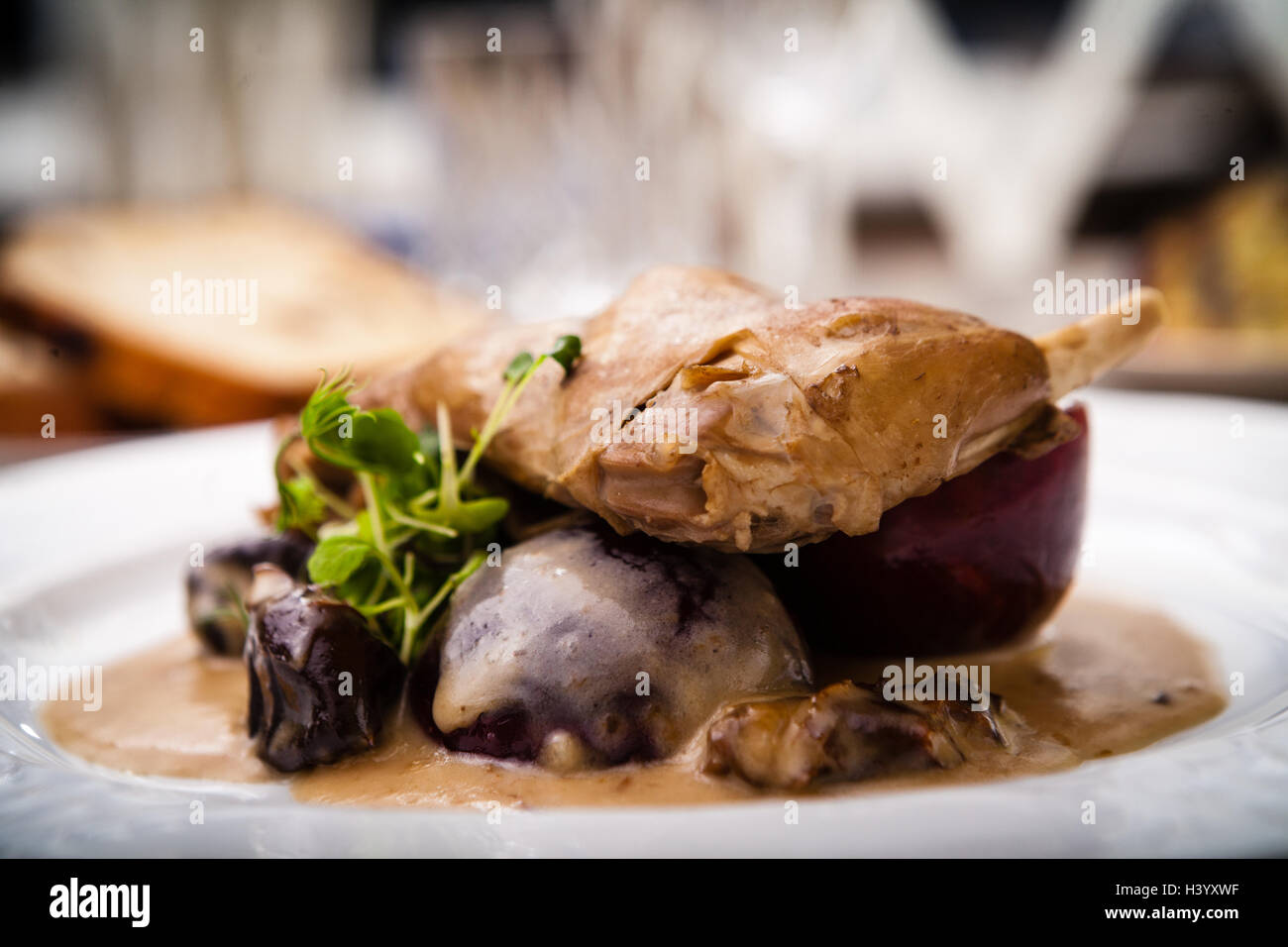 Stewed rabbit leg Stock Photo - Alamy
